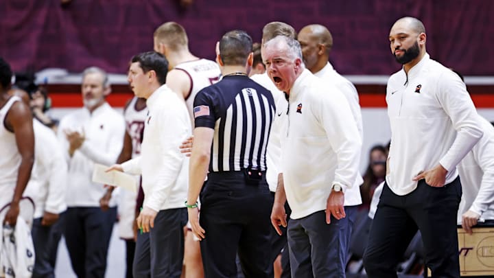 Jan 25, 2025; Blacksburg, Virginia, USA; Virginia Tech Hokies head coach Mike Young yells at a referee after a call during the first half against the Clemson Tigers at Cassell Coliseum. Mandatory Credit: Peter Casey-Imagn Images