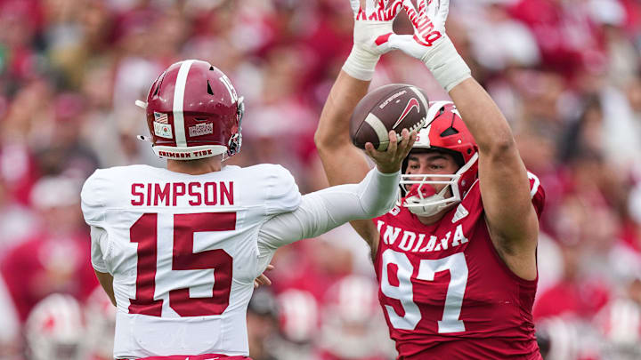 Alabama Crimson Tide quarterback Ty Simpson (15) throws the ball against Indiana Hoosiers defensive lineman Mario Landino (97) on Thursday, Jan. 1, 2026, during the 112th annual Rose Bowl game in Pasadena. Indiana Hoosiers defeated Alabama Crimson Tide, 38-3.