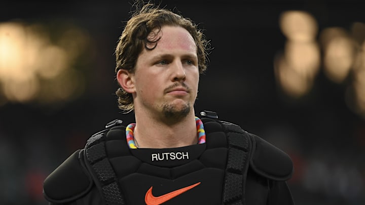 Aug 14, 2024; Baltimore, Maryland, USA; Baltimore Orioles catcher Adley Rutschman (35) stands on the field during the middle of the third inning against the Washington Nationals  at Oriole Park at Camden Yards