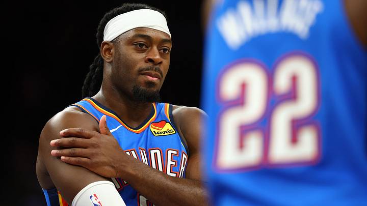 Apr 27, 2026; Phoenix, Arizona, USA; Oklahoma City Thunder guard Luguentz Dort (5) against the Phoenix Suns during game four of the first round of the 2026 NBA Playoffs at Mortgage Matchup Center. Mandatory Credit: Mark J. Rebilas-Imagn Images