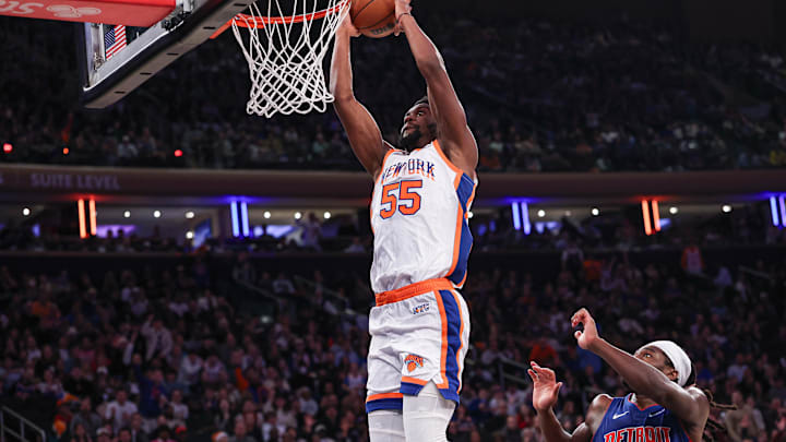 Dec 7, 2024; New York, New York, USA; New York Knicks center Ariel Hukporti (55) dunks during the second half against the Detroit Pistons at Madison Square Garden. Mandatory Credit: Vincent Carchietta-Imagn Images