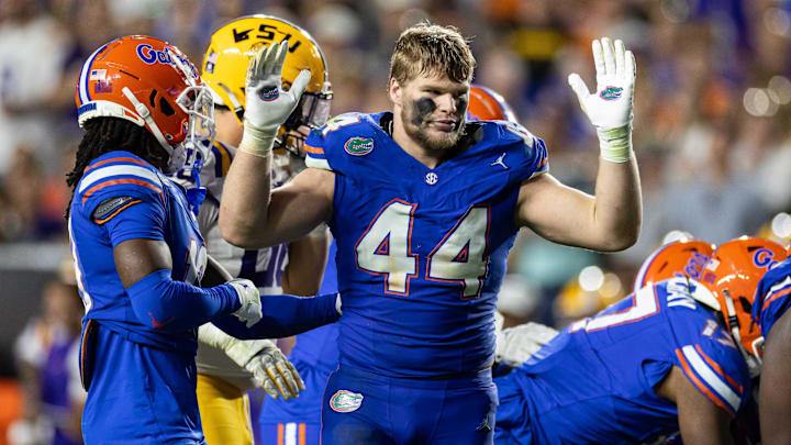 Nov 16, 2024; Gainesville, Florida, USA; Florida Gators defensive end Jack Pyburn (44) gestures after losing his helmet against the LSU Tigers during the second half at Ben Hill Griffin Stadium. Mandatory Credit: Matt Pendleton-Imagn Images