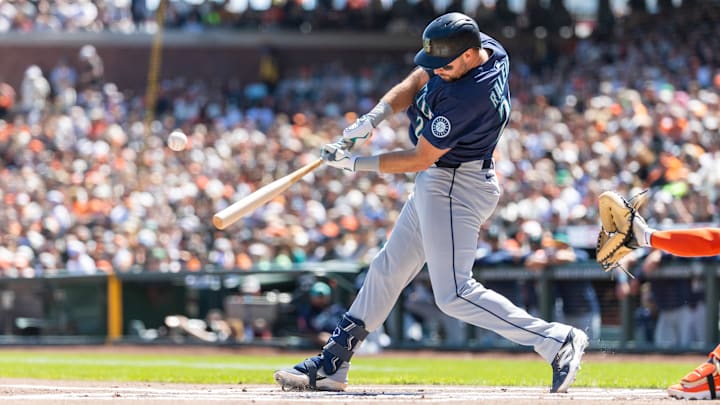 Seattle Mariners catcher Cal Raleigh singles during a game against the San Francisco Giants on April 4 at Oracle Park.