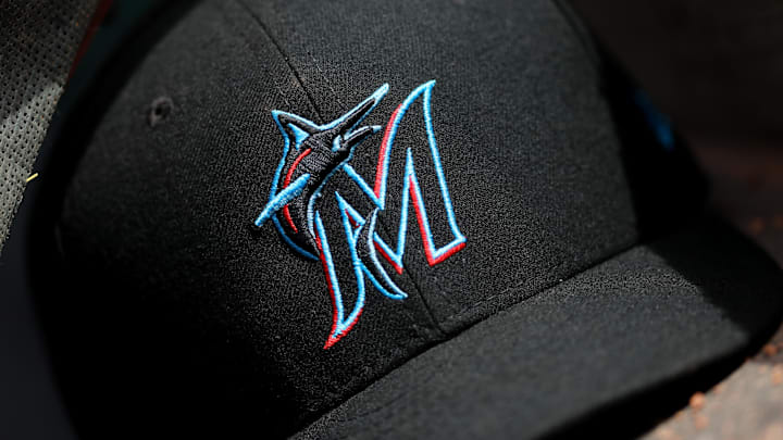 Apr 11, 2019; Cincinnati, OH, USA; A view of a New Era Miami Marlins hat in the dugout during the game against the Cincinnati Reds at Great American Ball Park.