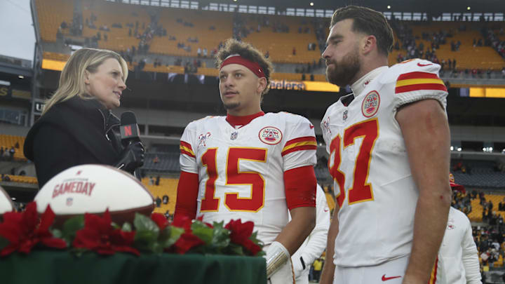 Dec 25, 2024; Pittsburgh, Pennsylvania, USA;  Netflix reporter Stacey Dales (left) interviews Kansas City Chiefs quarterback Patrick Mahomes (15) and tight end Travis Kelce (87) after the Chief defeated the Pittsburgh Steelers at Acrisure Stadium. Mandatory Credit: Charles LeClaire-Imagn Images