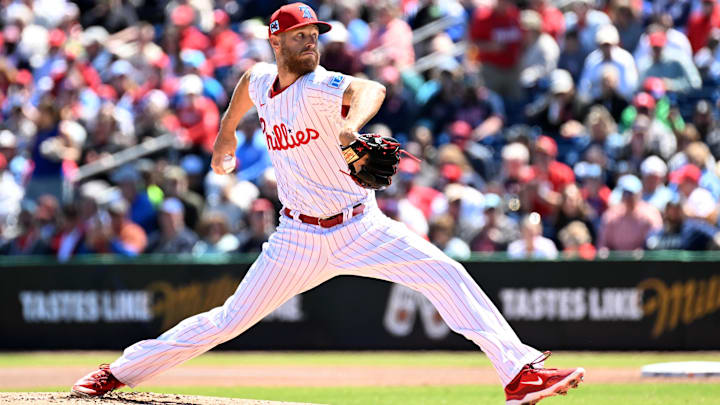 Mar 21, 2025; Clearwater, Florida, USA; Philadelphia Phillies starting pitcher Zach Wheeler (45) throws a pitch in the first inning against the Minnesota Twins during spring training  at BayCare Ballpark. 