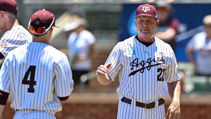 Jun 8, 2024; College Station, TX, USA; Texas A&M head coach Jim Schlossnagle greets players during introductions prior to the game against the Oregon at Olsen Field, Blue Bell Park.
