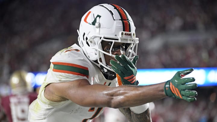 Oct 4, 2025; Tallahassee, Florida, USA; Miami Hurricanes wide receiver CJ Daniels (7) celebrates after a touchdown during the first half against the Florida State Seminoles at Doak S. Campbell Stadium. Mandatory Credit: Melina Myers-Imagn Images