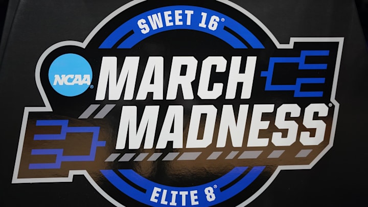 Mar 27, 2025; Indianapolis, IN, USA; The March Madness logo is seen during the NCAA tournament midwest regional practice day at Lucas Oil Stadium. Mandatory Credit: Robert Goddin-Imagn Images
