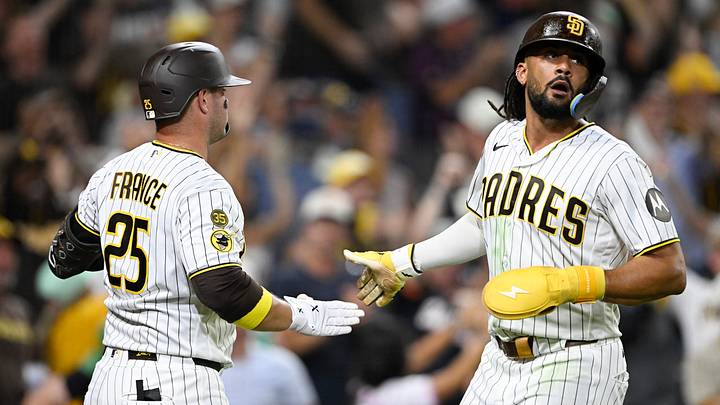 Sep 8, 2026; San Diego, California, USA; San Diego Padres right fielder Fernando Tatis Jr. (23) is congratulated by first baseman Ty France (25) after scoring during the eighth inning against the Washington Nationals at Petco Park. Mandatory Credit: Denis Poroy-Imagn Images Sep 8, 2026; San Diego, California, USA; San Diego Padres right fielder Fernando Tatis Jr. (23) is congratulated by first baseman Ty France (25) after scoring during the eighth inning against the Washington Nationals at Petco Park. Mandatory Credit: Denis Poroy-Imagn Images