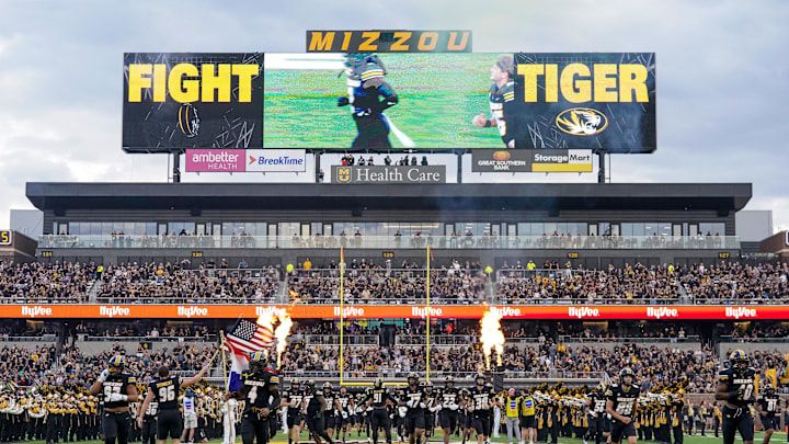 Sep 20, 2025; Columbia, Missouri, USA; The Missouri Tigers players run out on the field against the South Carolina Gamecocks prior to a game at Faurot Field at Memorial Stadium. Mandatory Credit: Denny Medley-Imagn Images Sep 20, 2025; Columbia, Missouri, USA; The Missouri Tigers players run out on the field against the South Carolina Gamecocks prior to a game at Faurot Field at Memorial Stadium. Mandatory Credit: Denny Medley-Imagn Images