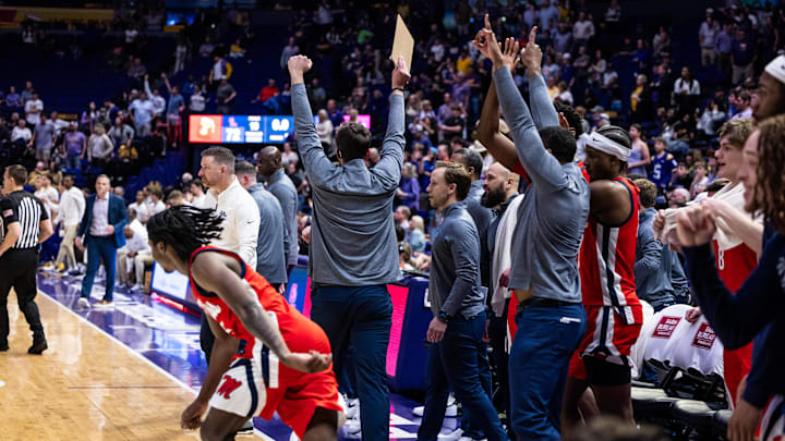 Feb 8, 2025; Baton Rouge, Louisiana, USA;  Mississippi Rebels react to defeating the LSU Tigers during the second half at Pete Maravich Assembly Center. Mandatory Credit: Stephen Lew-Imagn Images