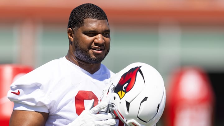 Jun 10, 2025; Tempe, AZ, USA; Arizona Cardinals defensive lineman Calais Campbell (93) holds his helmet during minicamp at the teams Arizona Cardinals Training Facility. Mandatory Credit: Mark J. Rebilas-Imagn Images Jun 10, 2025; Tempe, AZ, USA; Arizona Cardinals defensive lineman Calais Campbell (93) holds his helmet during minicamp at the teams Arizona Cardinals Training Facility. Mandatory Credit: Mark J. Rebilas-Imagn Images