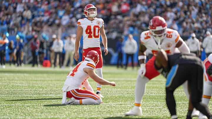 Nov 24, 2024; Charlotte, North Carolina, USA; Kansas City Chiefs place kicker Spencer Shrader (40) looks towards the goal post during a field goal attempt during the first quarter against the Carolina Panthers at Bank of America Stadium. Mandatory Credit: Jim Dedmon-Imagn Images