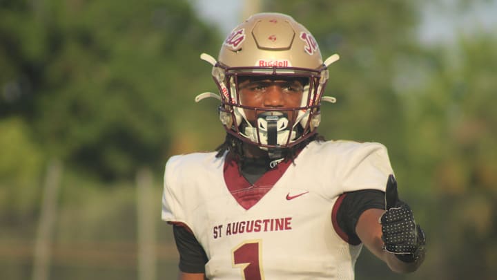St. Augustine wide receiver Somourian Wingo (1) responds to a signal from the sideline with a thumbs-up against Bishop Kenny during a high school spring football game on May 21, 2025. [Clayton Freeman/Florida Times-Union]