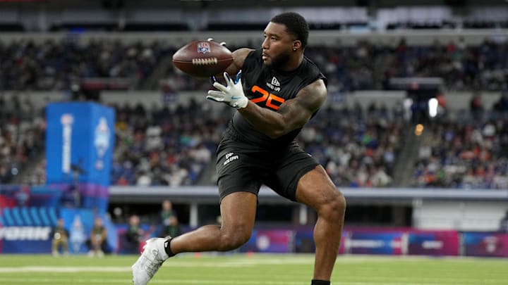 Mar 1, 2025; Indianapolis, IN, USA; Kansas running back Devin Neal (RB25) during the 2025 NFL Combine at Lucas Oil Stadium. Mandatory Credit: Kirby Lee-Imagn Images Mar 1, 2025; Indianapolis, IN, USA; Kansas running back Devin Neal (RB25) during the 2025 NFL Combine at Lucas Oil Stadium. Mandatory Credit: Kirby Lee-Imagn Images