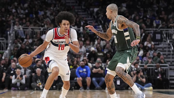 Oct 22, 2025; Milwaukee, Wisconsin, USA; Washington Wizards forward Kyshawn George (18) brings the ball up the court against Milwaukee Bucks forward Kyle Kuzma (18) in the second half at Fiserv Forum. Mandatory Credit: Michael McLoone-Imagn Images Oct 22, 2025; Milwaukee, Wisconsin, USA; Washington Wizards forward Kyshawn George (18) brings the ball up the court against Milwaukee Bucks forward Kyle Kuzma (18) in the second half at Fiserv Forum. Mandatory Credit: Michael McLoone-Imagn Images