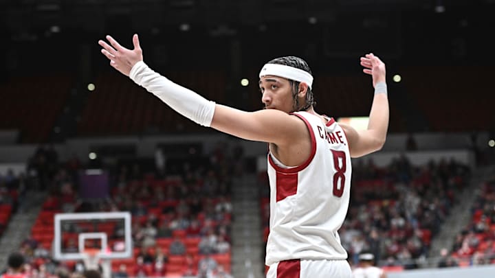 Jan 25, 2025; Pullman, Washington, USA; Washington State Cougars guard Nate Calmese (8) tries to get the crowd to cheer during the second half against the St. Mary's Gaels at Friel Court at Beasley Coliseum. St. Mary's won 80-75. Mandatory Credit: James Snook-Imagn Images