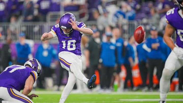 Nov 3, 2024; Minneapolis, Minnesota, USA; Minnesota Vikings place kicker Will Reichard (16) kicks an extra point against the Indianapolis Colts in the fourth quarter at U.S. Bank Stadium. Mandatory Credit: Brad Rempel-Imagn Images