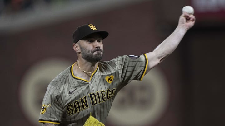 Sep 13, 2024; San Francisco, California, USA; San Diego Padres relief pitcher Tanner Scott (66) pitches during the seventh inning against the San Francisco Giants at Oracle Park. Sep 13, 2024; San Francisco, California, USA; San Diego Padres relief pitcher Tanner Scott (66) pitches during the seventh inning against the San Francisco Giants at Oracle Park.