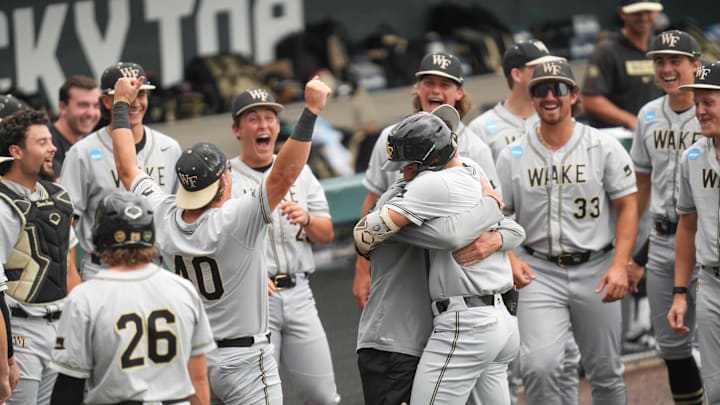 The Wake Forest baseball team celebrates after Wake Forest infielder Marek Houston (7) hits a home run during a NCAA regional baseball game between the Cincinnati Bearcats and Wake Forest Demon Deacons at Lindsey Nelson Stadium in Knoxville, Tenn., on June 1, 2025.