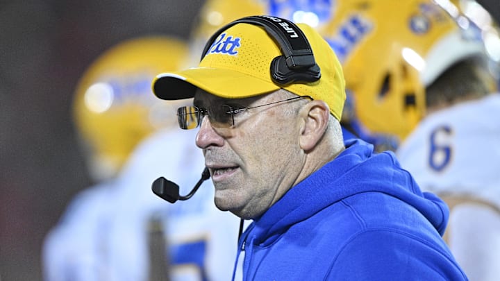Nov 23, 2024; Louisville, Kentucky, USA;  Pittsburgh Panthers head coach Pat Narduzzi calls a play from the sideline during the second half against the Louisville Cardinals at L&N Federal Credit Union Stadium. Louisville defeated Pittsburgh 37-9. Mandatory Credit: Jamie Rhodes-Imagn Images