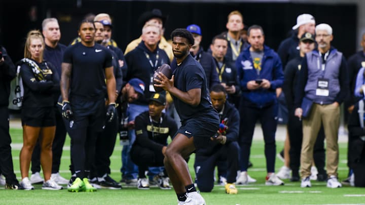 Apr 4, 2025; Boulder, CO, USA; Colorado Buffaloes quarterback Shedeur Sanders (2) looks to make a pass at the University of Colorado NFL Showcase at the CU Indoor Practice Facility. Mandatory Credit: Michael Ciaglo-Imagn Images