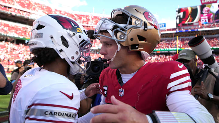 Oct 6, 2024; Santa Clara, California, USA; San Francisco 49ers quarterback Brock Purdy (right) and Arizona Cardinals quarterback Kyler Murray (left) greet each other after the game at Levi's Stadium. Mandatory Credit: Darren Yamashita-Imagn Images Oct 6, 2024; Santa Clara, California, USA; San Francisco 49ers quarterback Brock Purdy (right) and Arizona Cardinals quarterback Kyler Murray (left) greet each other after the game at Levi's Stadium. Mandatory Credit: Darren Yamashita-Imagn Images