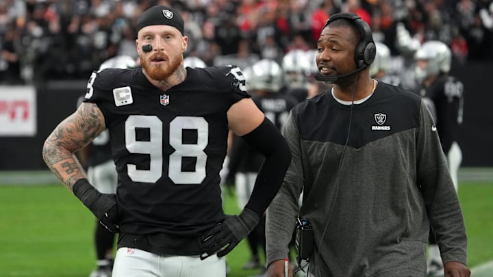 Jan 7, 2023; Paradise, Nevada, USA; Las Vegas Raiders defensive end Maxx Crosby (98) and defensive coordinator Patrick Graham talk during their game against the Kansas City Chiefs in the first half at Allegiant Stadium. Mandatory Credit: Kirby Lee-Imagn Images