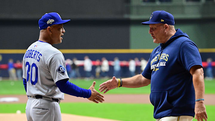 Oct 13, 2025; Milwaukee, Wisconsin, USA; Los Angeles Dodgers manager Dave Roberts (30) greets Milwaukee Brewers manager Pat Murphy (49) prior to game one of the NLCS round for the 2025 MLB playoffs at American Family Field. Mandatory Credit: Benny Sieu-Imagn Images Oct 13, 2025; Milwaukee, Wisconsin, USA; Los Angeles Dodgers manager Dave Roberts (30) greets Milwaukee Brewers manager Pat Murphy (49) prior to game one of the NLCS round for the 2025 MLB playoffs at American Family Field. Mandatory Credit: Benny Sieu-Imagn Images