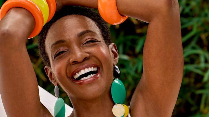 Roshumba Williams was photographed by Yu Tsai in Jamaica. Swimsuit by DOLLA Paris. Bracelets by Ben-Amun. Earrings by SIMONMILLER. 