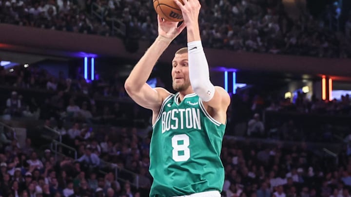 May 10, 2025; New York, New York, USA; Boston Celtics center Kristaps Porzingis (8) takes a jump shot against the New York Knicks in the third quarter during game three of the second round for the 2025 NBA Playoffs at Madison Square Garden. Mandatory Credit: Wendell Cruz-Imagn Images