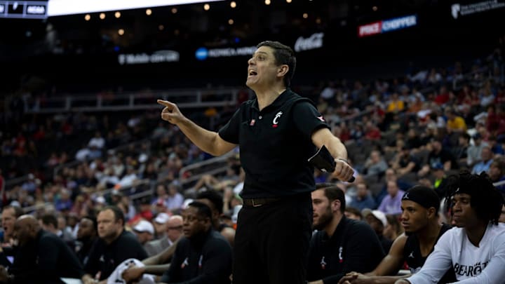 Cincinnati Bearcats head coach Wes Miller coaches in the second half of the Big 12 Conference tournament game between Cincinnati Bearcats and Baylor Bears at T-Mobile Center in Kansas City, Mo., on Thursday, March 14, 2024. Cincinnati Bearcats head coach Wes Miller coaches in the second half of the Big 12 Conference tournament game between Cincinnati Bearcats and Baylor Bears at T-Mobile Center in Kansas City, Mo., on Thursday, March 14, 2024.