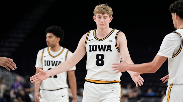 Iowa Hawkeyes guard Cooper Koch (8)