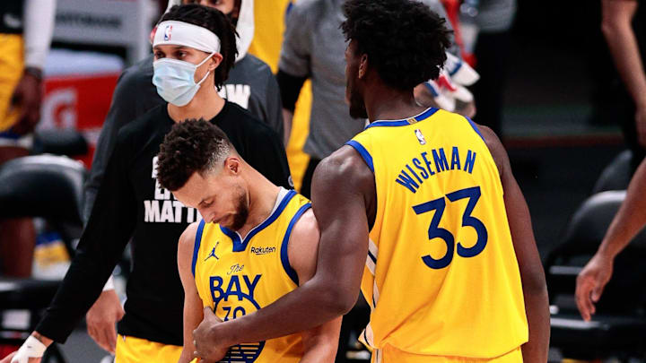 Jan 14, 2021; Denver, Colorado, USA; Golden State Warriors guard Stephen Curry (30) reacts with center James Wiseman (33) in the fourth quarter against the Denver Nuggets at Ball Arena. Mandatory Credit: Isaiah J. Downing-Imagn Images Jan 14, 2021; Denver, Colorado, USA; Golden State Warriors guard Stephen Curry (30) reacts with center James Wiseman (33) in the fourth quarter against the Denver Nuggets at Ball Arena. Mandatory Credit: Isaiah J. Downing-Imagn Images