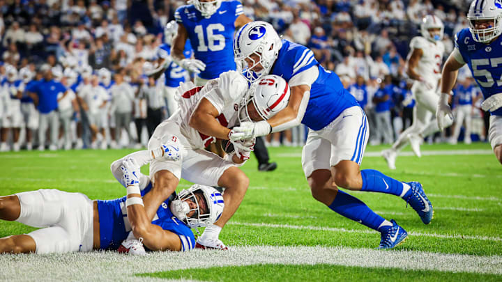 BYU linebacker Jack Kelly and Faletau Satuala force a safety against Stanford