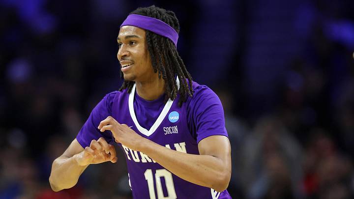 Mar 20, 2026; Philadelphia, PA, USA; Furman Paladins guard Alex Wilkins (10) reacts against the UConn Huskies in the first half during a first round game of the men's 2026 NCAA Tournament at Xfinity Mobile Arena. Mandatory Credit: Bill Streicher-Imagn Images