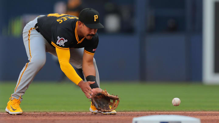 Mar 27, 2025; Miami, Florida, USA; Pittsburgh Pirates second baseman Nick Gonzales (39) catches a ground ball against Miami Marlins first baseman Jonah Bride (not pictured) during the first inning at loanDepot Park. Mandatory Credit: Sam Navarro-Imagn Images