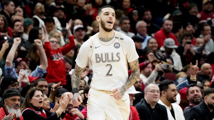 Jan 4, 2025; Chicago, Illinois, USA; Chicago Bulls guard Lonzo Ball (2) reacts after making a three point basket against the New York Knicks during the second half at United Center. Mandatory Credit: David Banks-Imagn Images