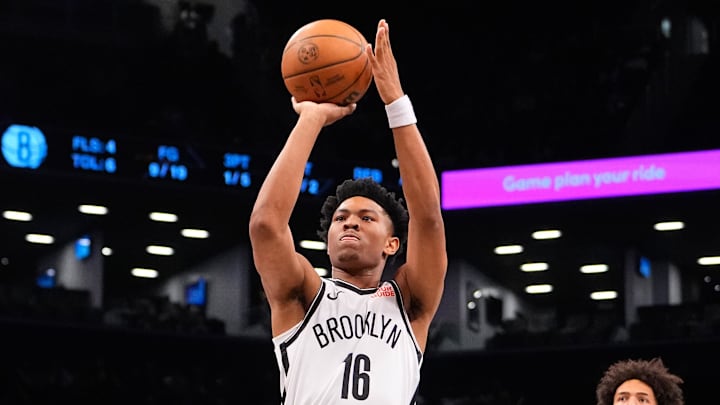 Oct 14, 2024; Brooklyn, New York, USA; Brooklyn Nets guard Jaylen Martin (16) shoots a free throw against the Washington Wizards during the first half at Barclays Center. Mandatory Credit: Gregory Fisher-Imagn Images