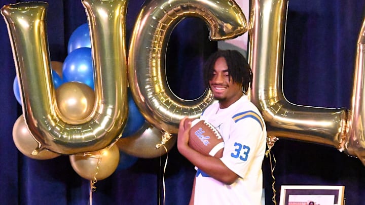Oak Hills running back Karson Cox, who is heading to UCLA, poses for a photo on Tuesday, Dec. 3, 2024. Oak Hills hosted a signing event for five players that will be signing a National Letter of Intent during the three-day Early Signing Period.