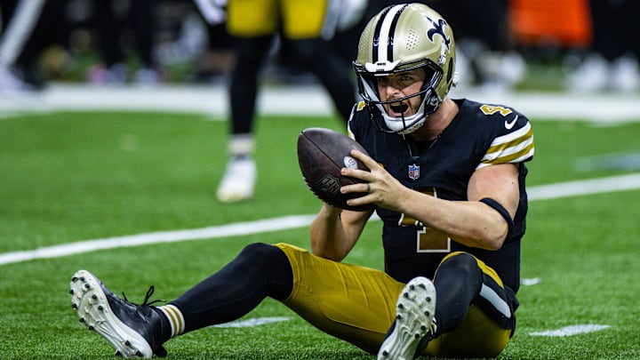 Dec 10, 2023; New Orleans, Louisiana, USA; New Orleans Saints quarterback Derek Carr (4) reacts to