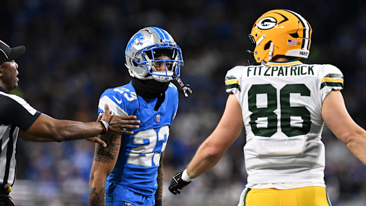 Dec 5, 2024; Detroit, Michigan, USA; Detroit Lions cornerback Carlton Davis III (23) and Green Bay Packers tight end John FitzPatrick (86) exchange words in the second quarter at Ford Field. Mandatory Credit: Lon Horwedel-Imagn Images Dec 5, 2024; Detroit, Michigan, USA; Detroit Lions cornerback Carlton Davis III (23) and Green Bay Packers tight end John FitzPatrick (86) exchange words in the second quarter at Ford Field. Mandatory Credit: Lon Horwedel-Imagn Images
