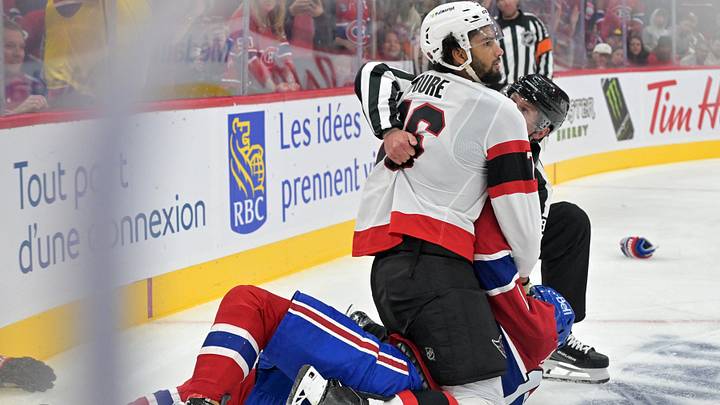 Sep 26, 2026; Montreal, Quebec, CAN;  Ottawa Senators defenseman Djibril Toure (76) takes down Montreal Canadiens forward Josh Anderson (17) during the second period at the Bell Centre.  Mandatory Credit: Eric Bolte-Imagn Images