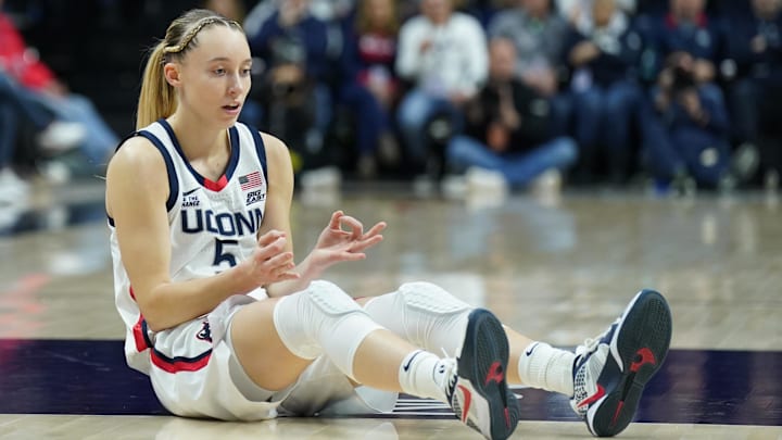 Jan 22, 2025; Storrs, Connecticut, USA; UConn Huskies guard Paige Bueckers (5) reacts after her three point basket and being fouled by the Villanova Wildcats in the first half at Harry A. Gampel Pavilion. Mandatory Credit: David Butler II-Imagn Images Jan 22, 2025; Storrs, Connecticut, USA; UConn Huskies guard Paige Bueckers (5) reacts after her three point basket and being fouled by the Villanova Wildcats in the first half at Harry A. Gampel Pavilion. Mandatory Credit: David Butler II-Imagn Images