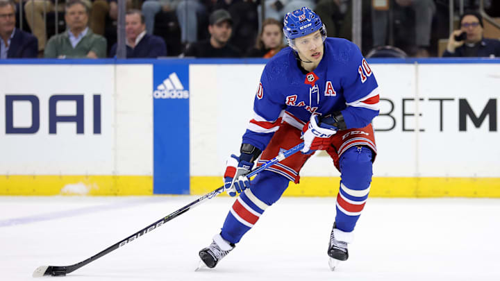 Feb 20, 2024; New York, New York, USA; New York Rangers left wing Artemi Panarin (10) brings the
