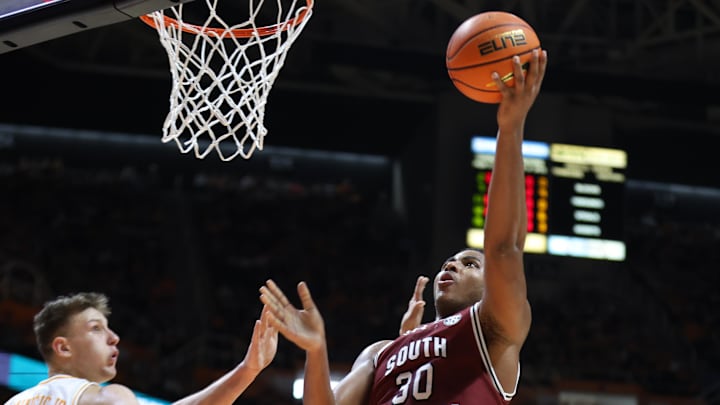 Mar 8, 2025; Knoxville, Tennessee, USA; South Carolina Gamecocks forward Collin Murray-Boyles (30) goes to the basket against the Tennessee Volunteers during the second half at Thompson-Boling Arena at Food City Center. Mar 8, 2025; Knoxville, Tennessee, USA; South Carolina Gamecocks forward Collin Murray-Boyles (30) goes to the basket against the Tennessee Volunteers during the second half at Thompson-Boling Arena at Food City Center.