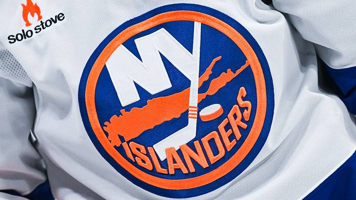 Dec 3, 2024; Montreal, Quebec, CAN; View of a New York Islanders logo on a jersey worn by a member of the team during warm-up before the game against the Montreal Canadiens at Bell Centre. Mandatory Credit: David Kirouac-Imagn Images