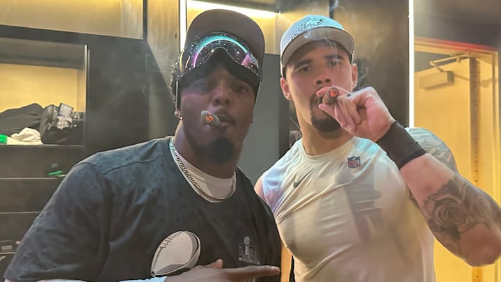 Zack Baun (left) and fellow linebacker Nakobe Dean celebrate winning Super Bowl LIX.