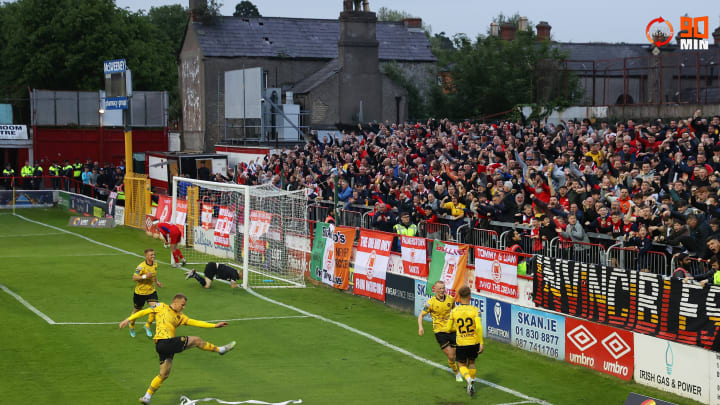 Curtis (no. 22) celebrates a goal against Shelbourne
